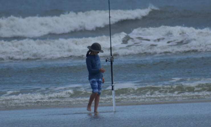 Young boy fishing off the beaches of Little Talbot Island