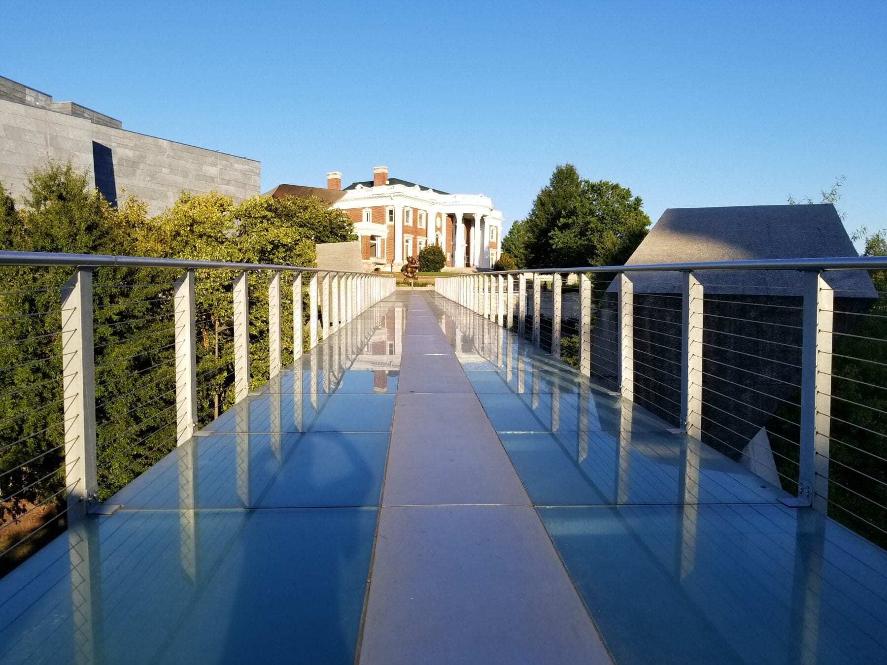 Chattanooga, TN: Glass and steel walking bridge leading to a mansion