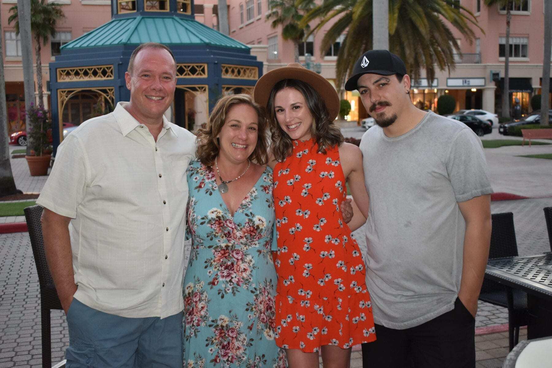 Travel blogger Kathy Brown stands with her husband, daughter and Son in law for a picture.  This image was taken in Boca Raton, Florida for her 50th birthday. 