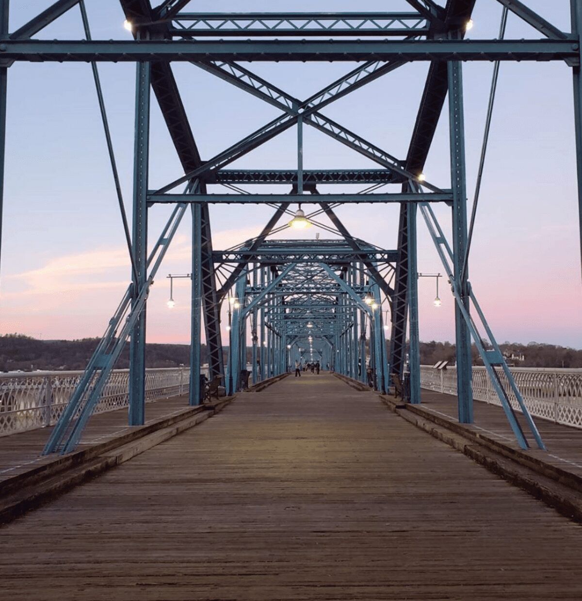 Tourist walking over the bridge in Chattanooga, TN Image: Kathy Brown