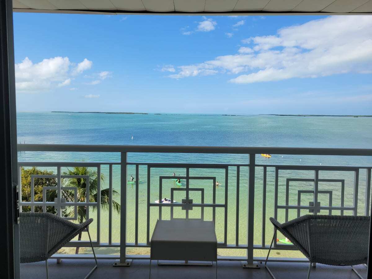 Balcony view with scenery of blue and green Key Largo ocean waters
