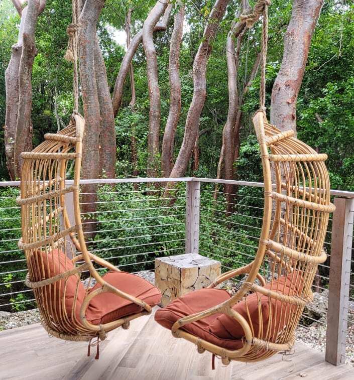 tropical hanging chairs in a tropical seating Key Large Baker's Cay Resort. Image: Kathy Brown US Travel Blogger