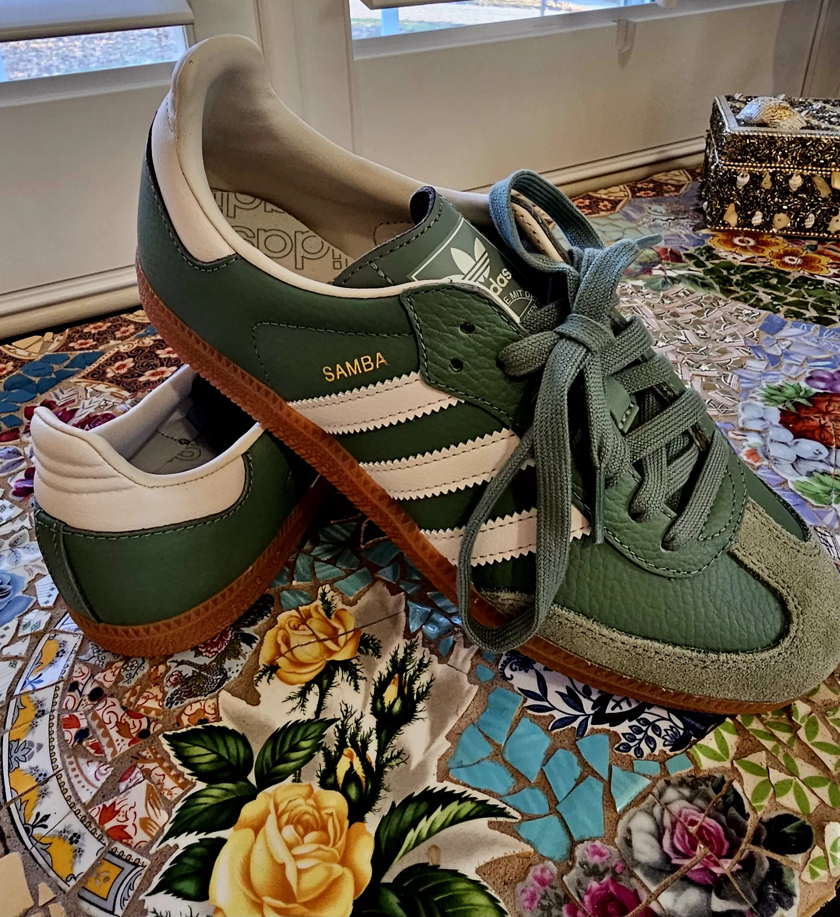 adidas Samba walking shoes in green with three stripes down the side.  Perfect for long walks and exercise on the San Antonio River Walk. Texas