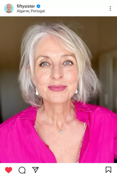 Mature Influencer Gail of Fifty Sister is looking fabulous in pink and gray hair. This mature Instagrammer is beautiful and showing age is just a number.